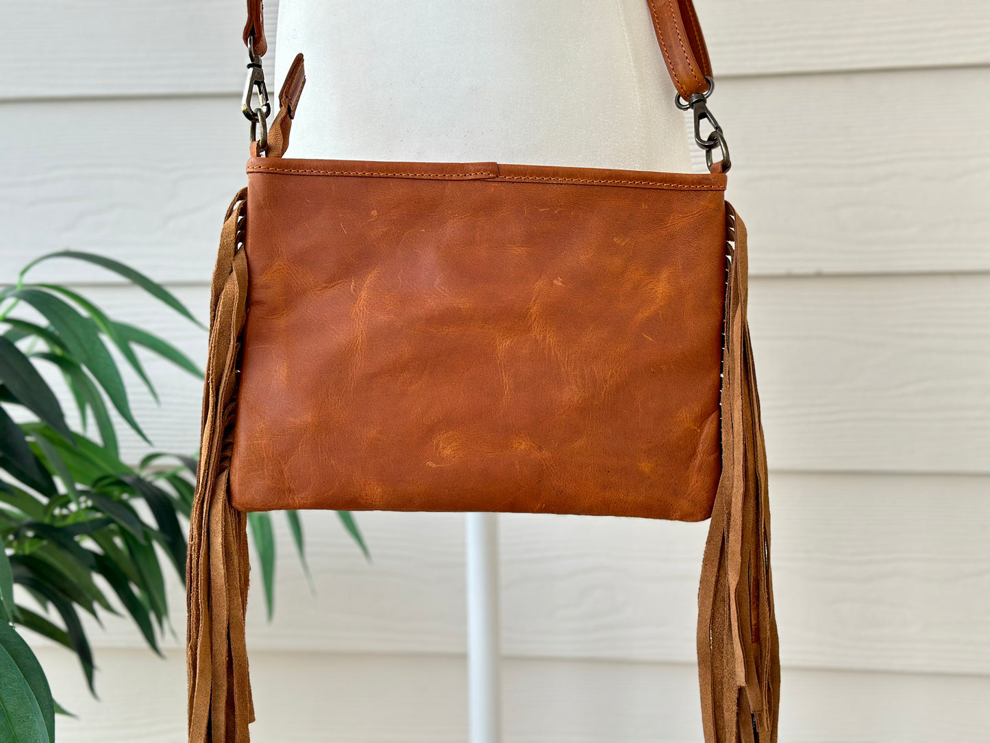 Cowhide Crossbody with Fringes in Tan And Gold - Harper