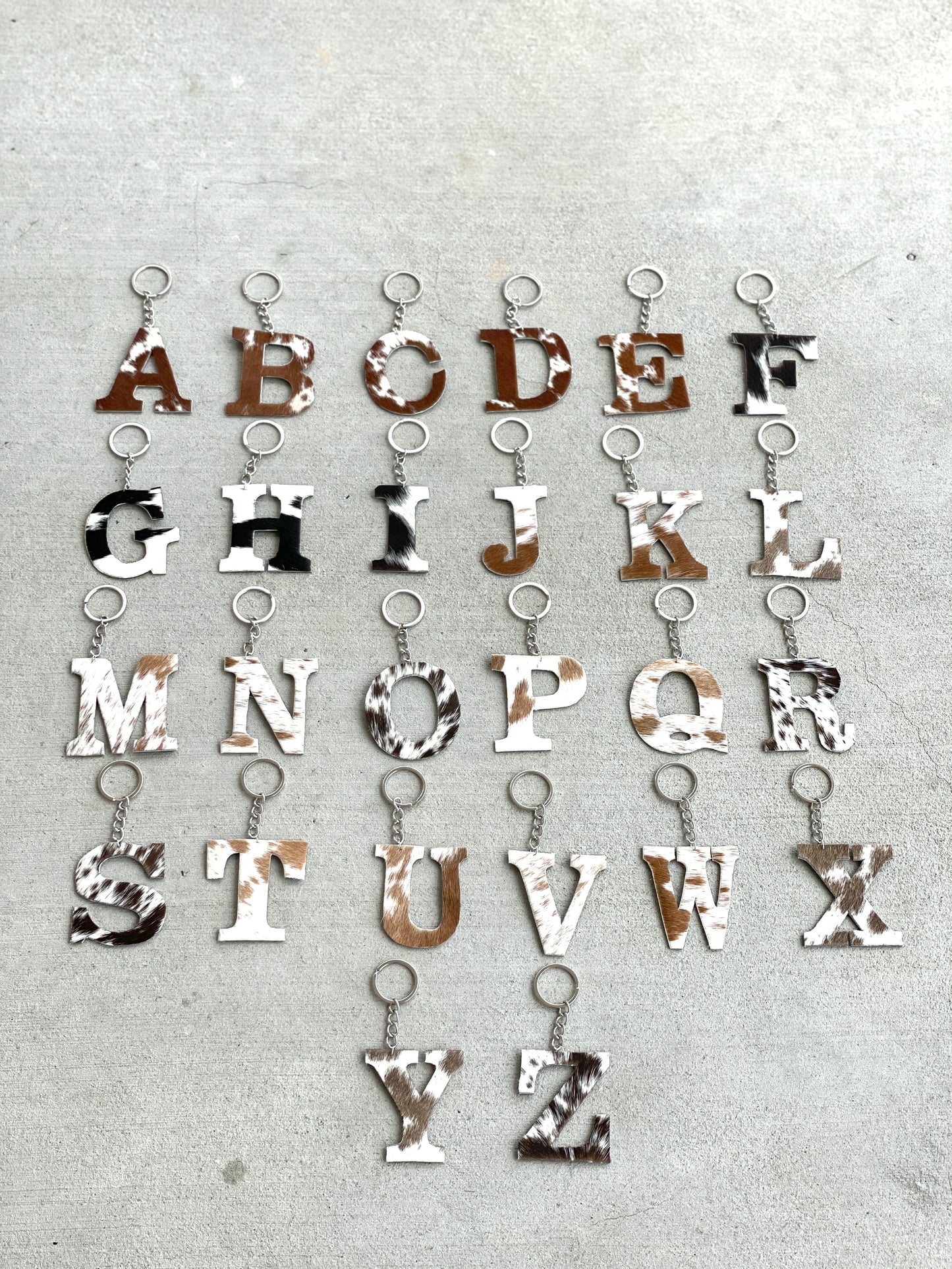 Cowhide Initial Keychain in Black, Brown and Tan
