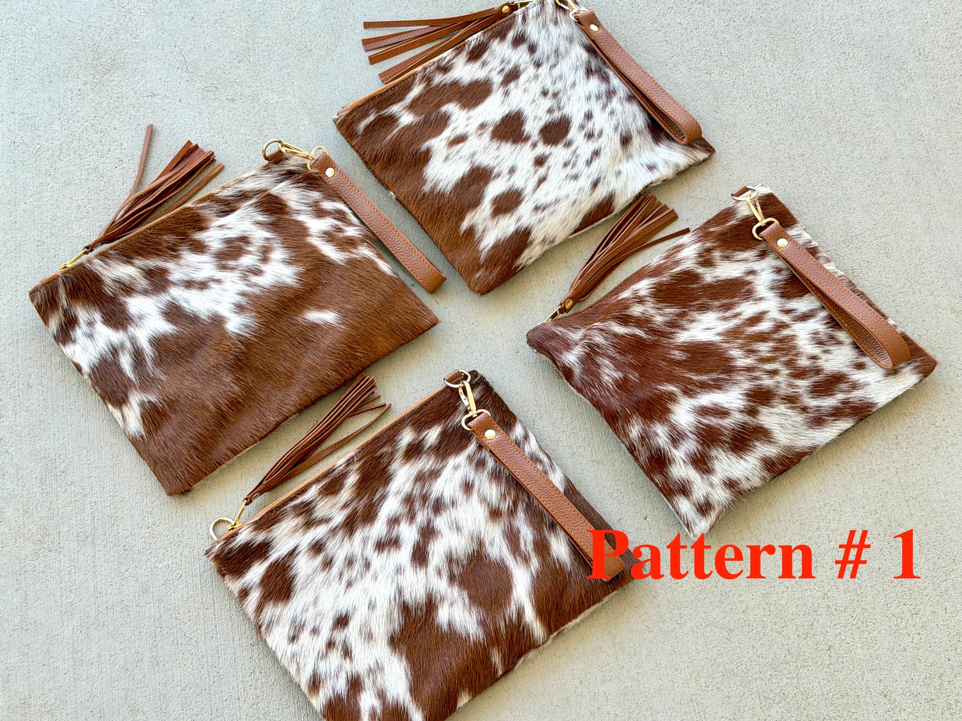 Handcrafted genuine cowhide crossbody purse with hair-on-hide front, leather tassel, adjustable strap, and western leather design for everyday wear, travel, rodeos, and concerts.