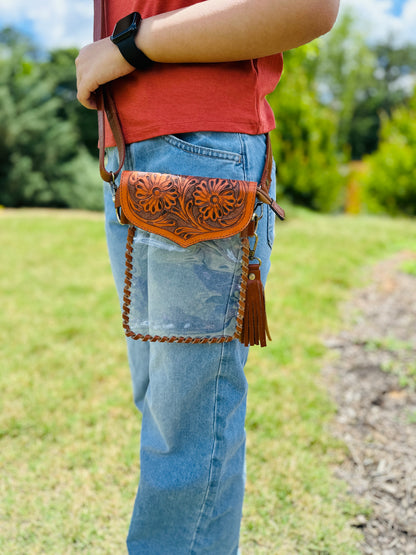 Handcrafted clear crossbody bag with genuine tooled leather accents. Stadium-approved western concert purse, perfect for rodeos, games, festivals, and everyday use.