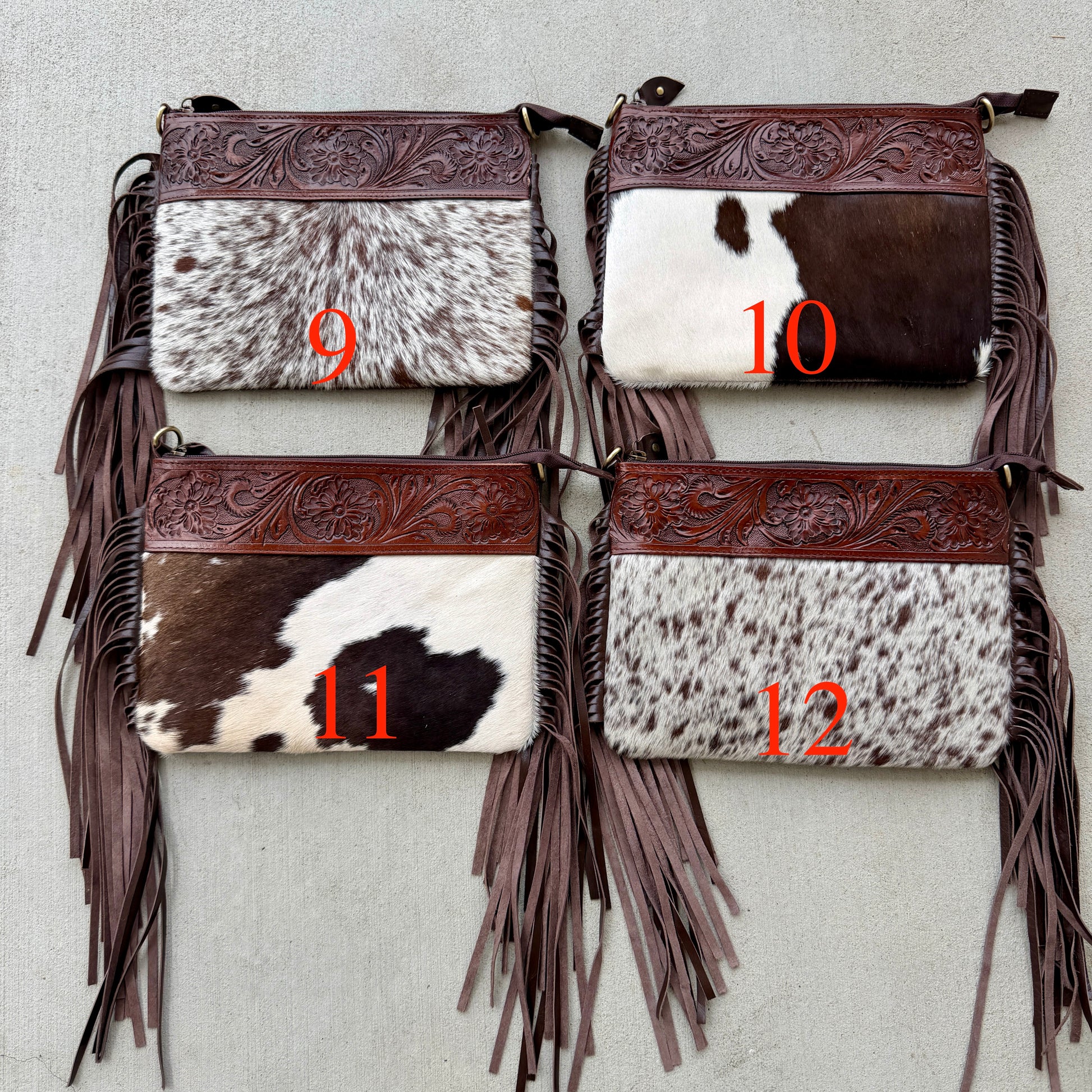 Handcrafted genuine cowhide crossbody bag with floral tooled leather, long leather fringe, adjustable strap, and zip-top closure for western, rodeo, and everyday style.