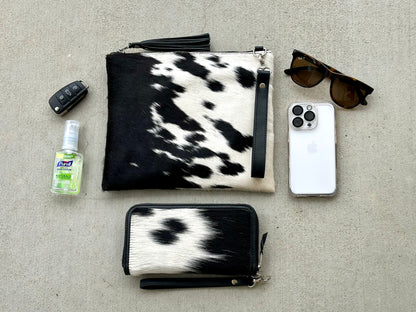 Handcrafted genuine cowhide crossbody purse with hair-on-hide front, leather tassel, adjustable strap, and western leather design for everyday wear, travel, rodeos, and concerts.