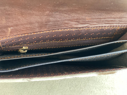 Handcrafted genuine cowhide leather crossbody purse with adjustable strap, western hair-on-hide handbag for rodeos, festivals, concerts, and everyday wear.