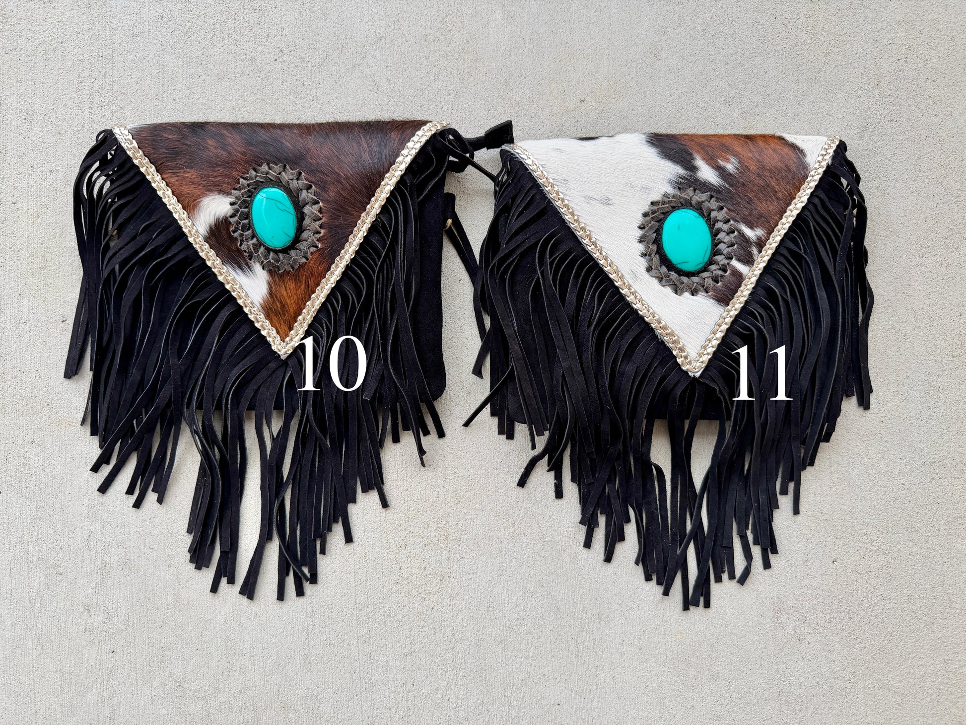 Handcrafted western cowhide crossbody bag with turquoise stone concho, whipstitched envelope flap, long leather fringe, and adjustable strap for rodeos, concerts, and everyday wear.