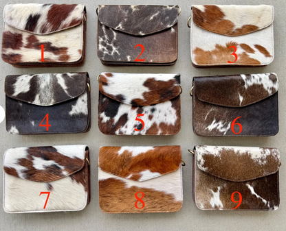 Handcrafted genuine cowhide leather crossbody purse with adjustable strap, western hair-on-hide handbag for rodeos, festivals, concerts, and everyday wear.