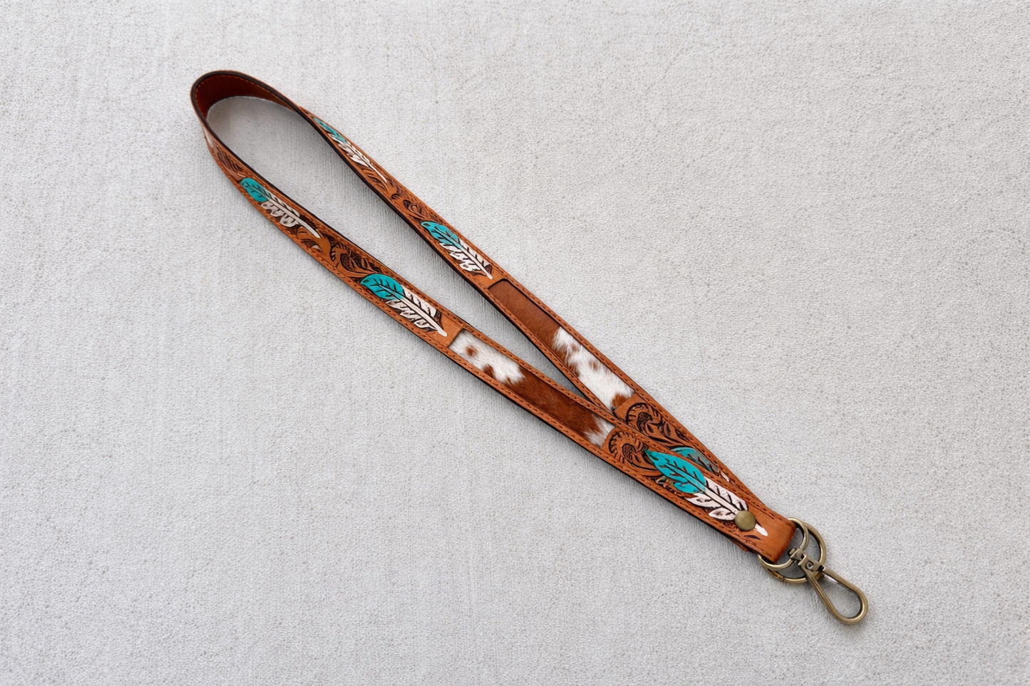 Western Cowhide Lanyard with Turquoise Feather Design | Tooled Leather ID Holder